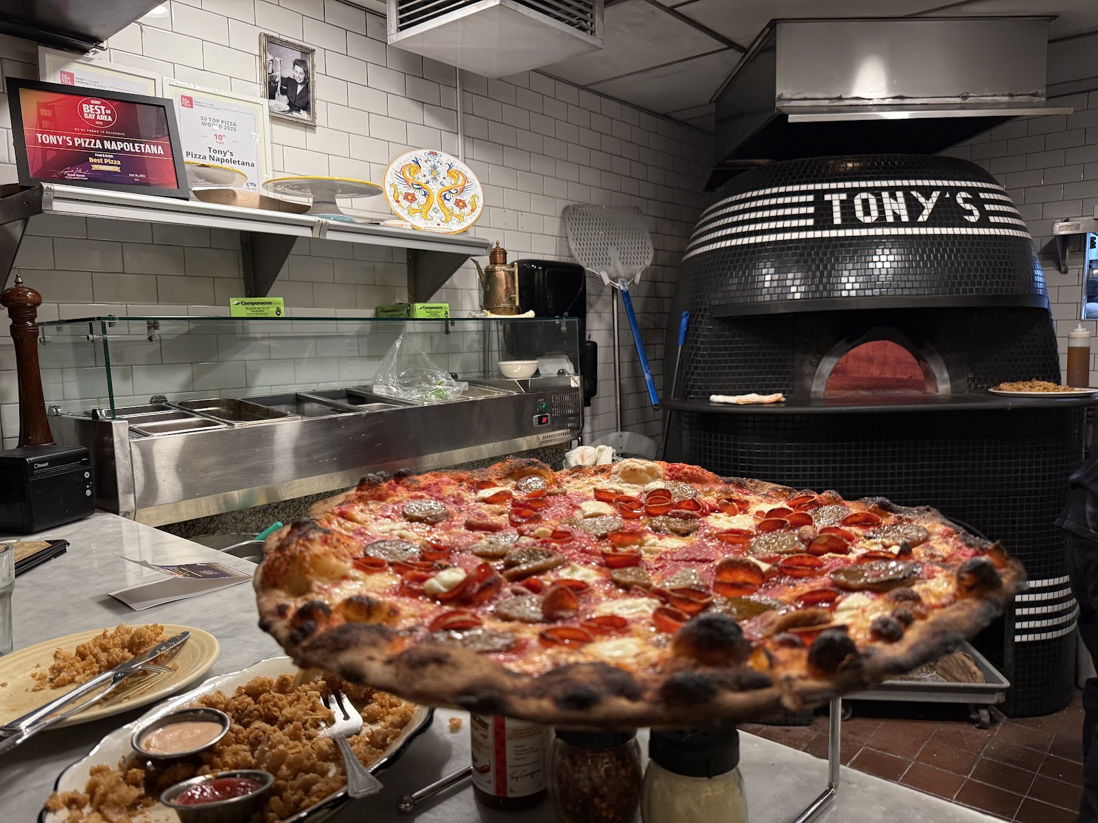 Tony's Pizza — Oficiais